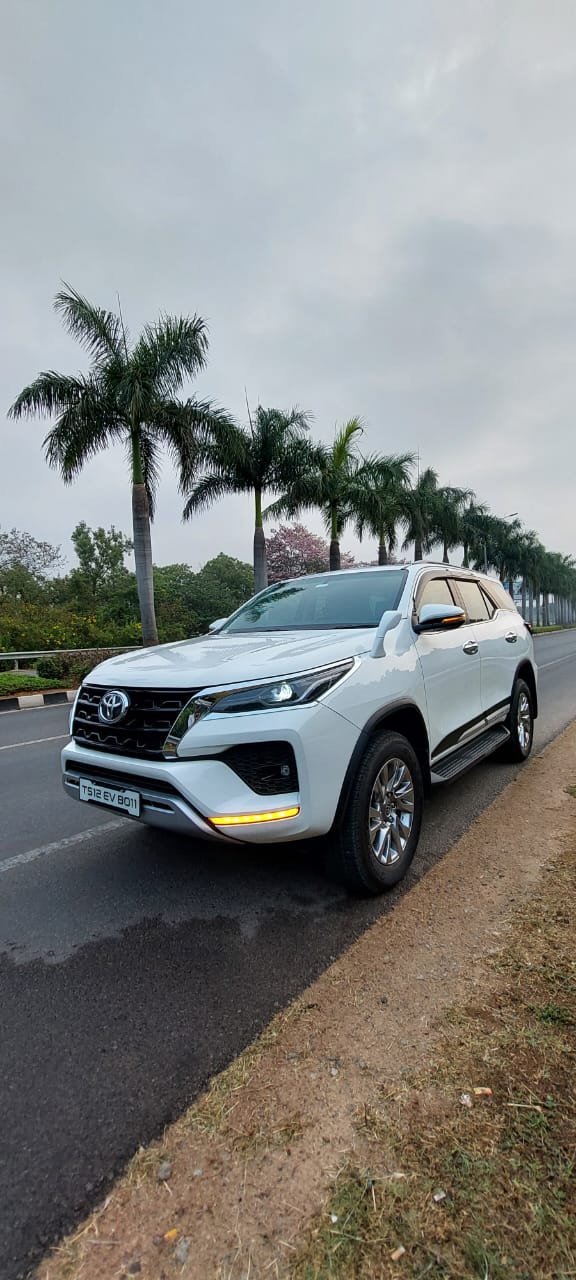 White Toyota Fortuner wedding car